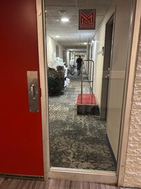 Hallways after hallways all with doors just to get to the front desk