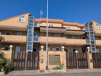 The building where most of the rooms are