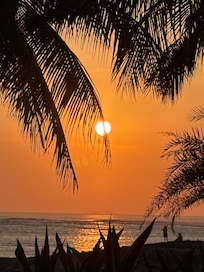 Amazing sunset sipping cocktails on the pool deck