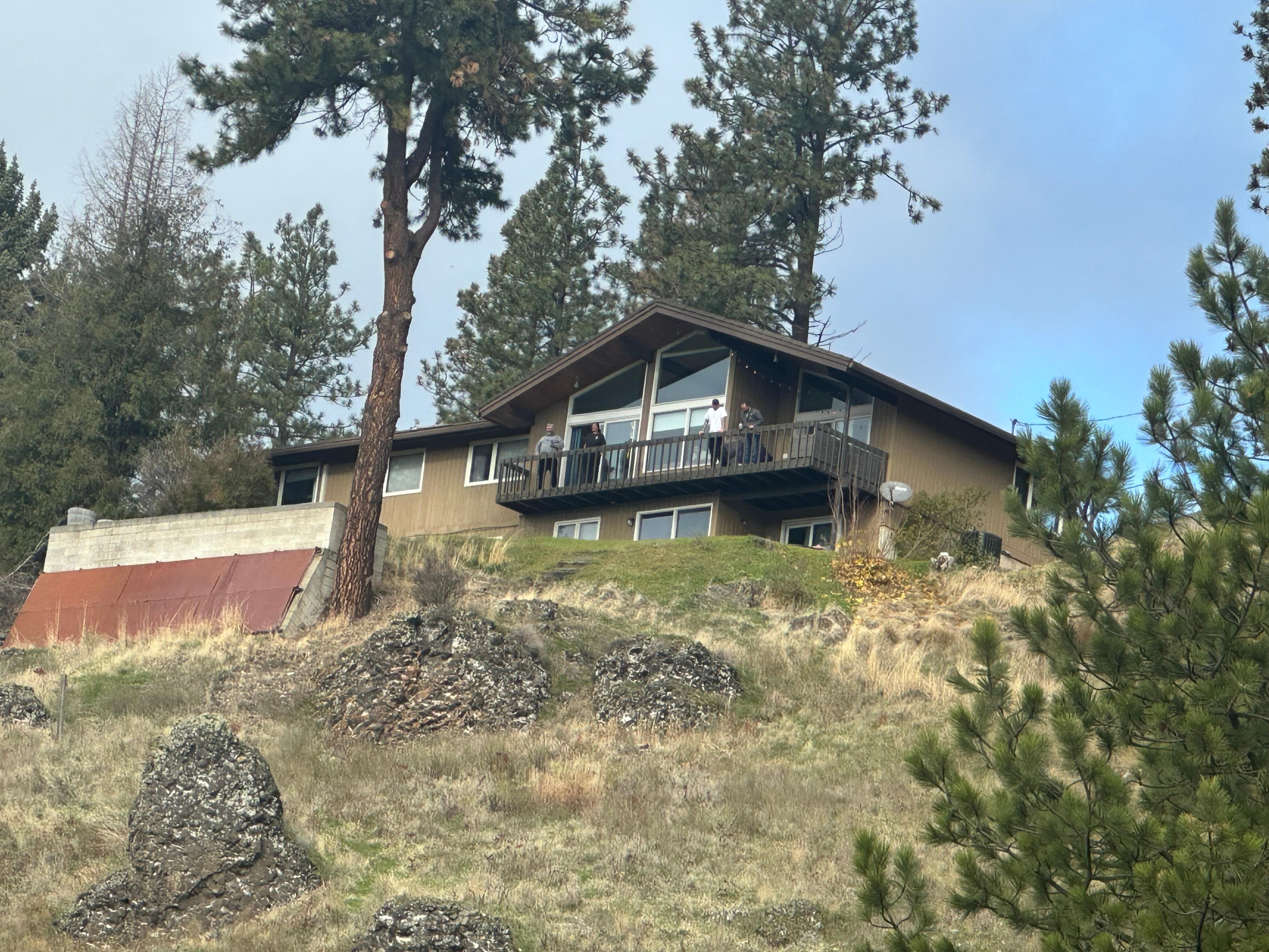 From the park below with great walking/running paths right on the river