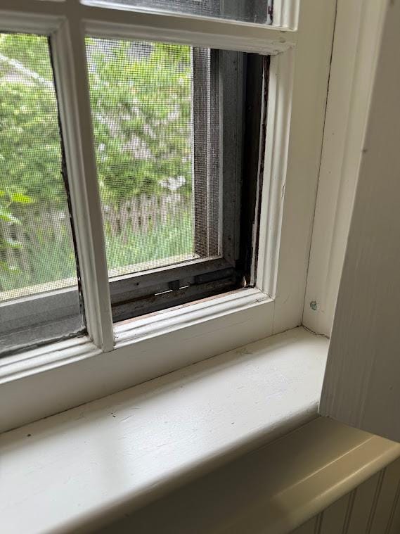 A broken window in the bathroom