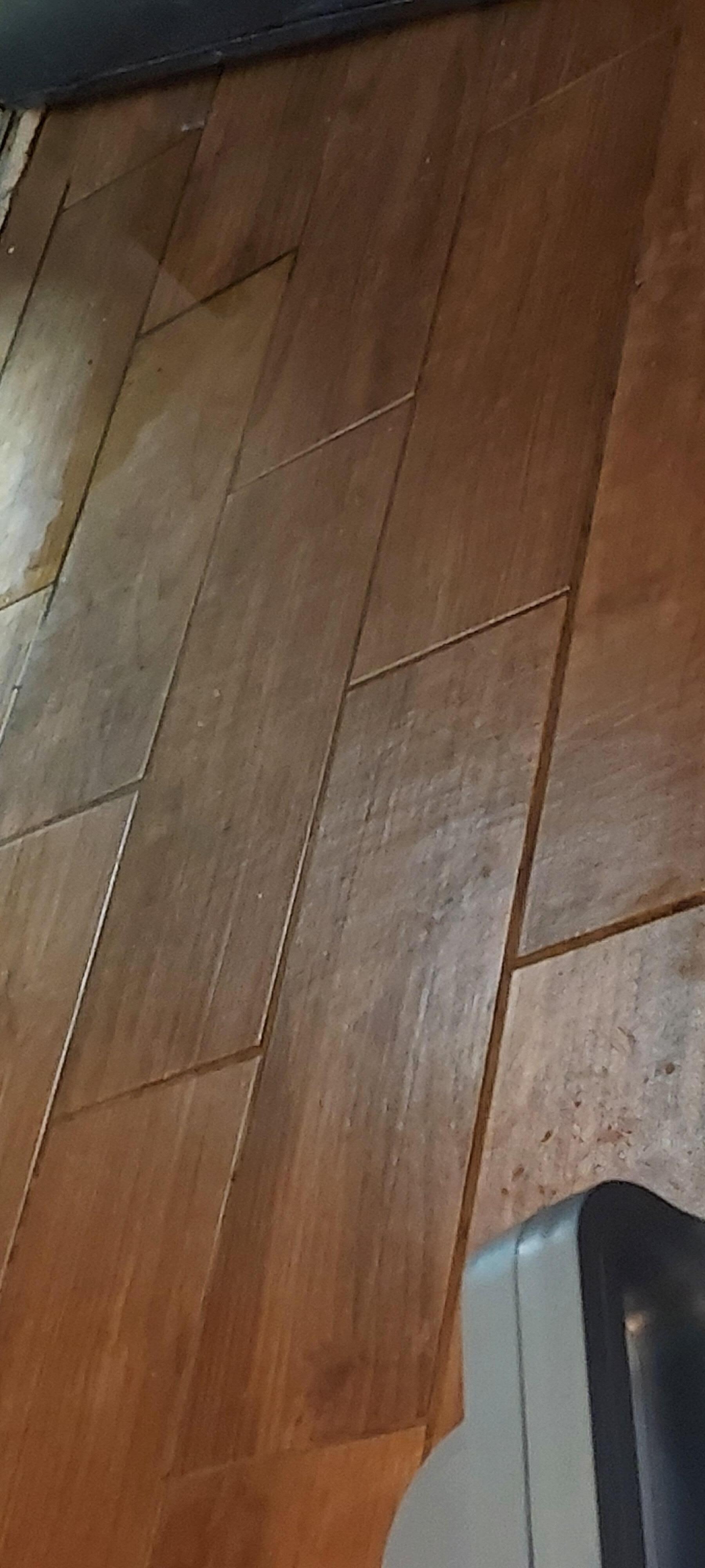 Water in floor from leak above door