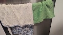Filthy rags to dry dishes with