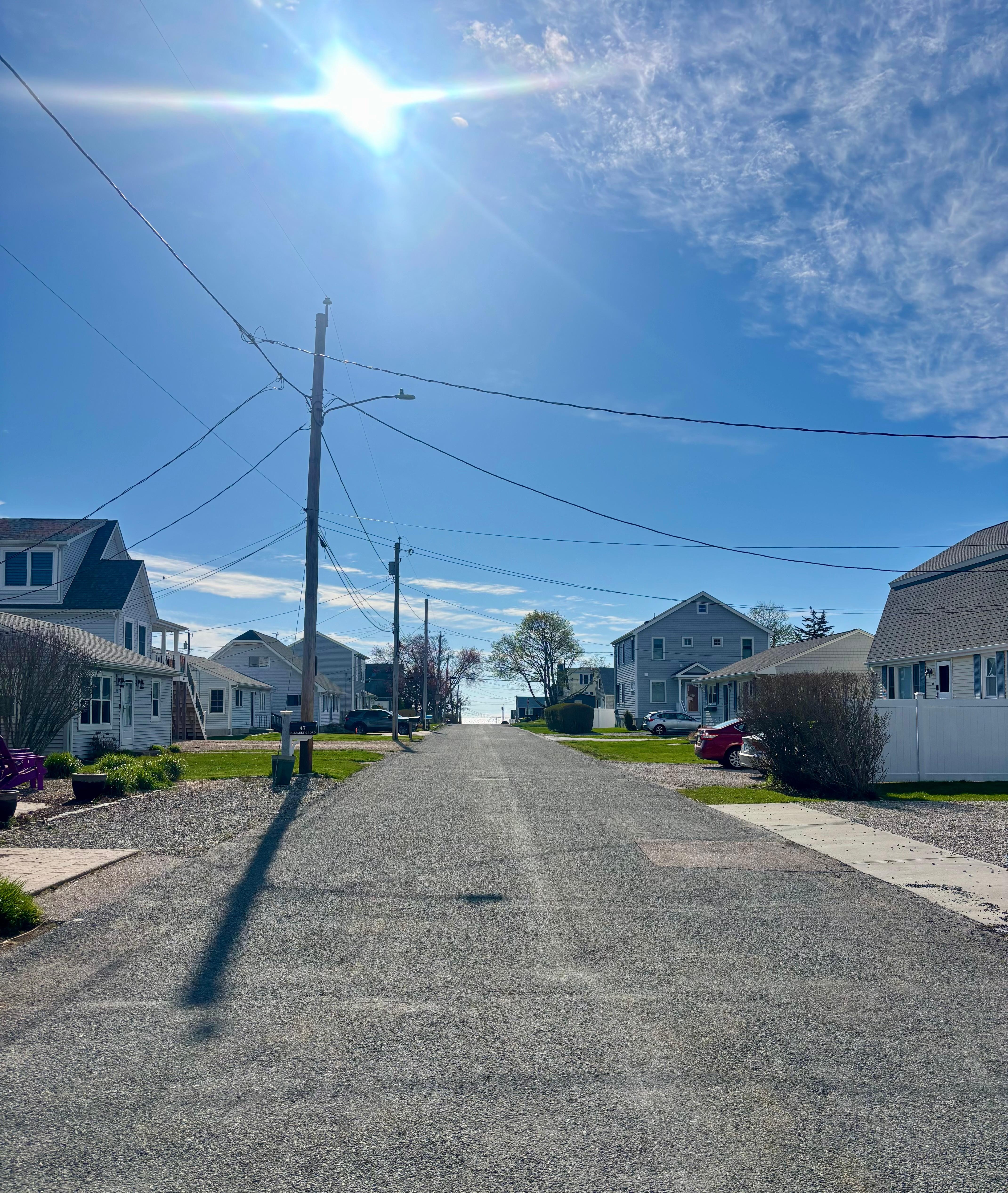 View from the driveway.  Short walk to the beach.