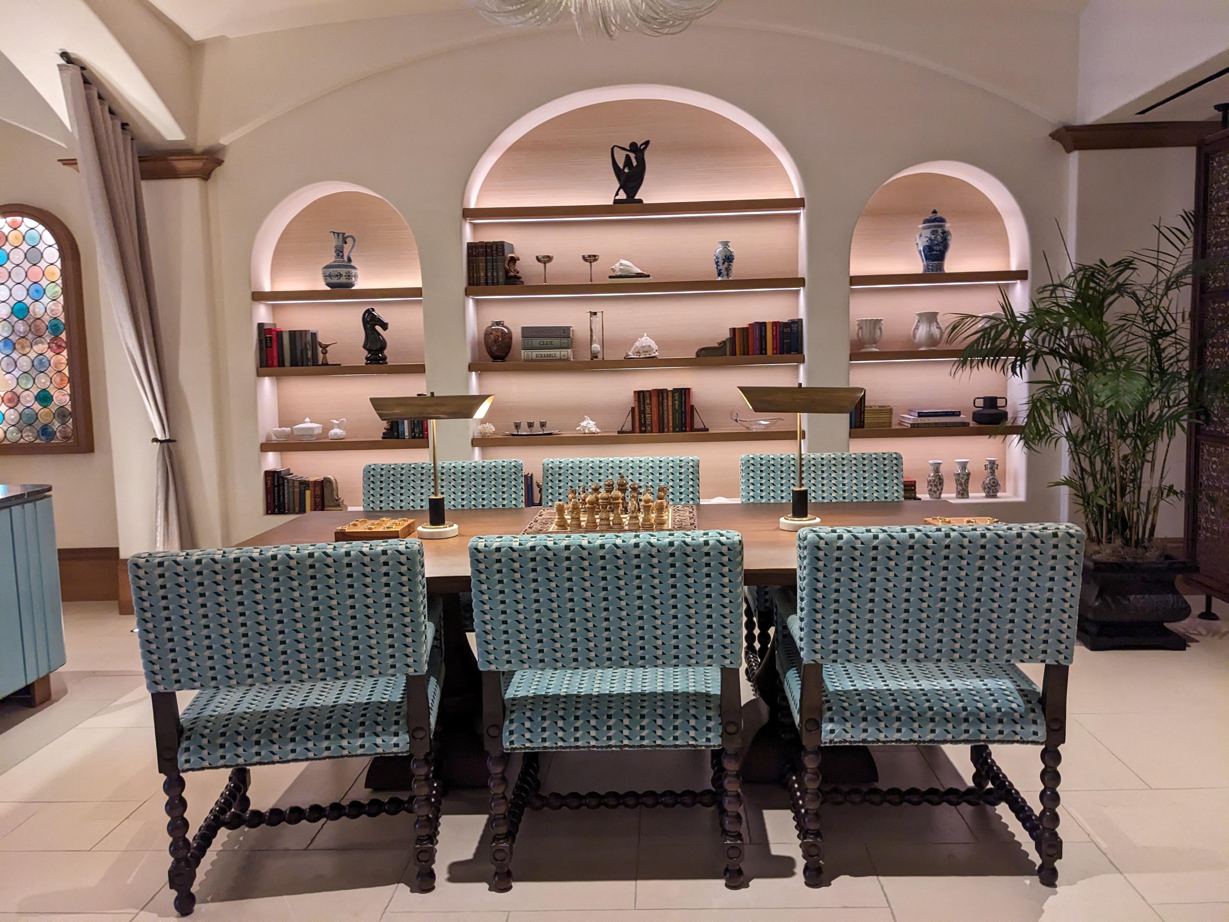 Chess, books, game table in lobby
