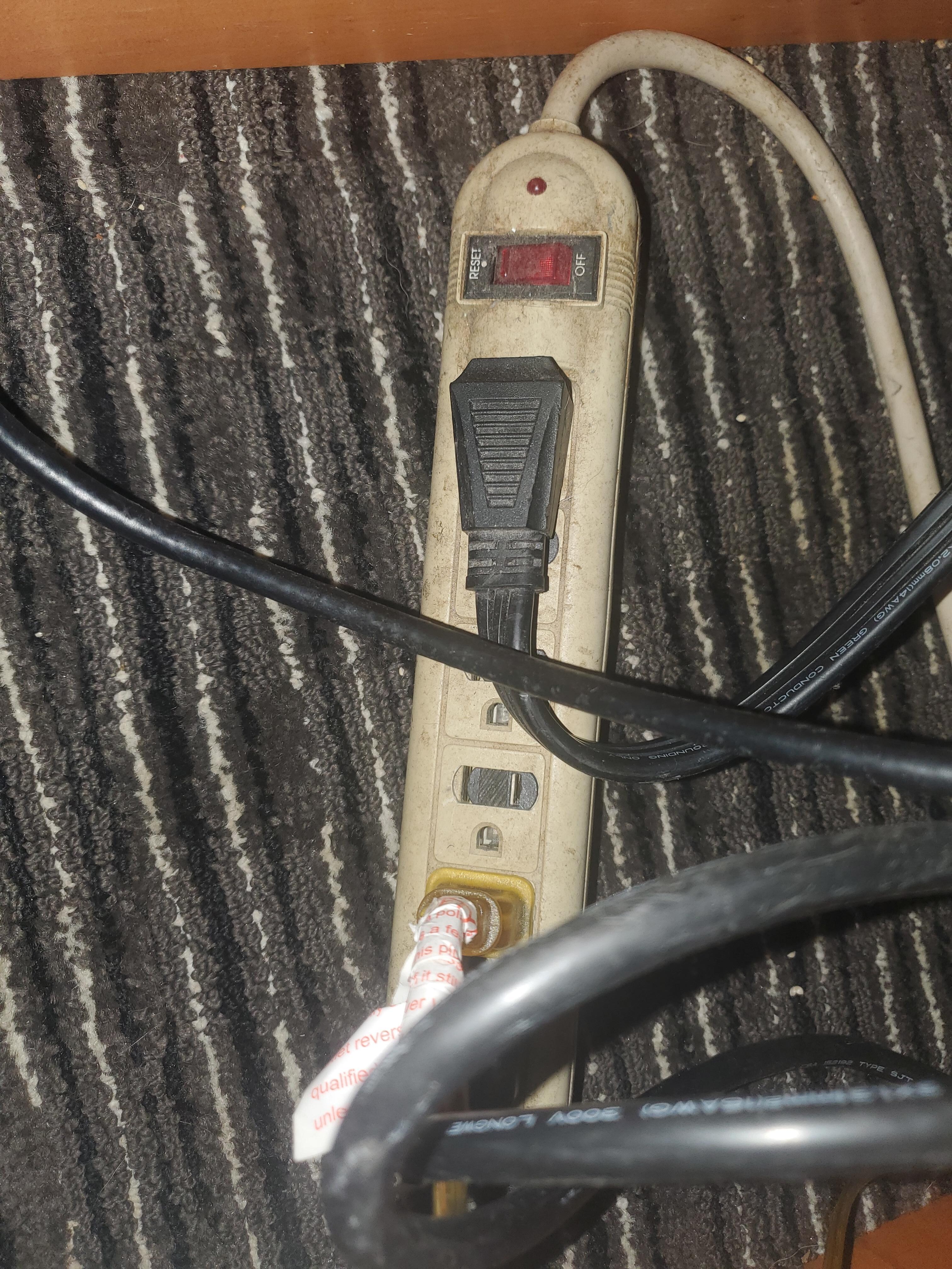 Dirty surge protector.