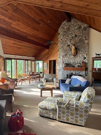 Living room, has huge windows looking out over the lake.