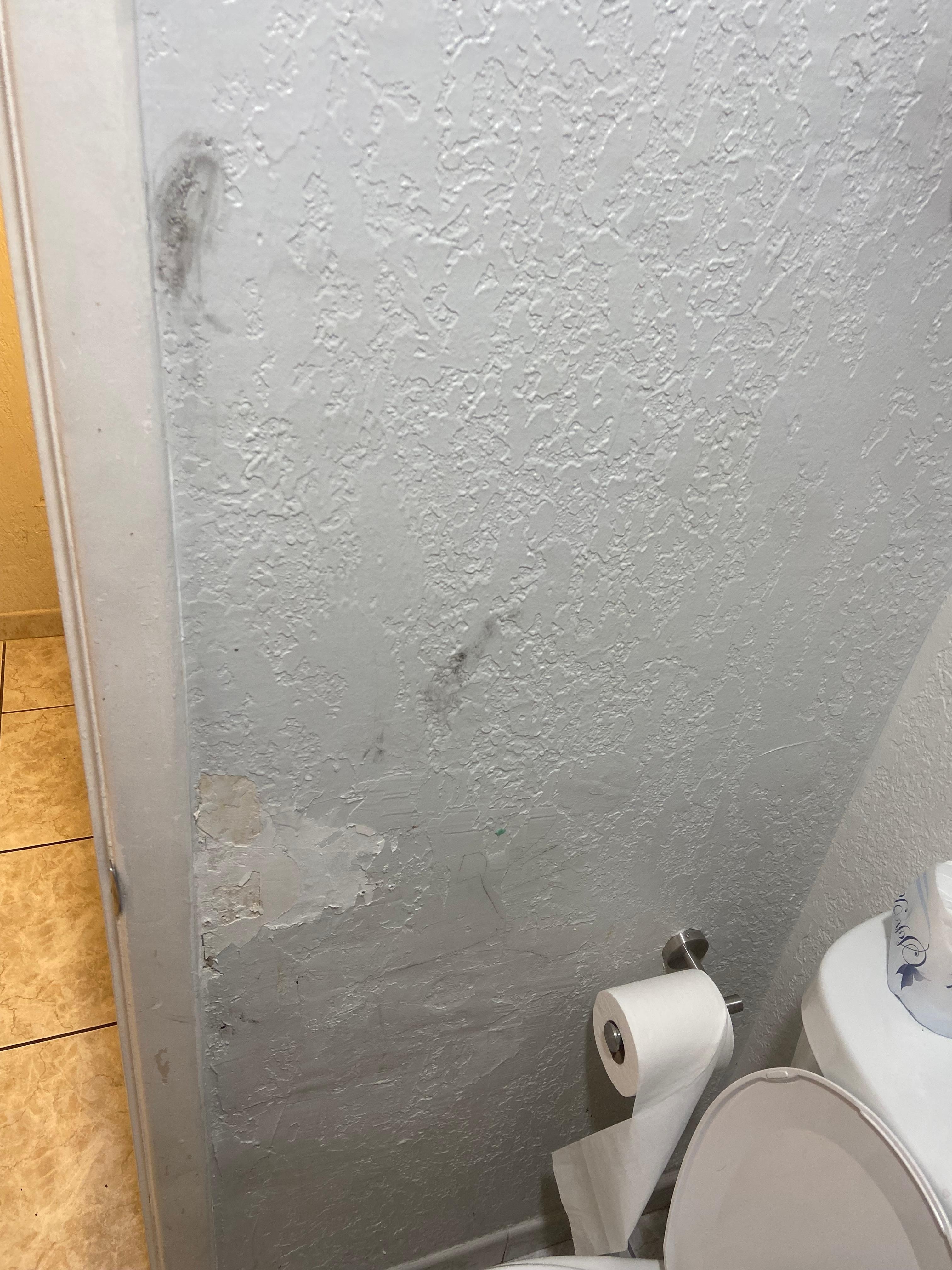 Dirty patched up wall