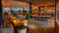 Panorama of indoor bar/restaurant area. Outdoor patio available as well.