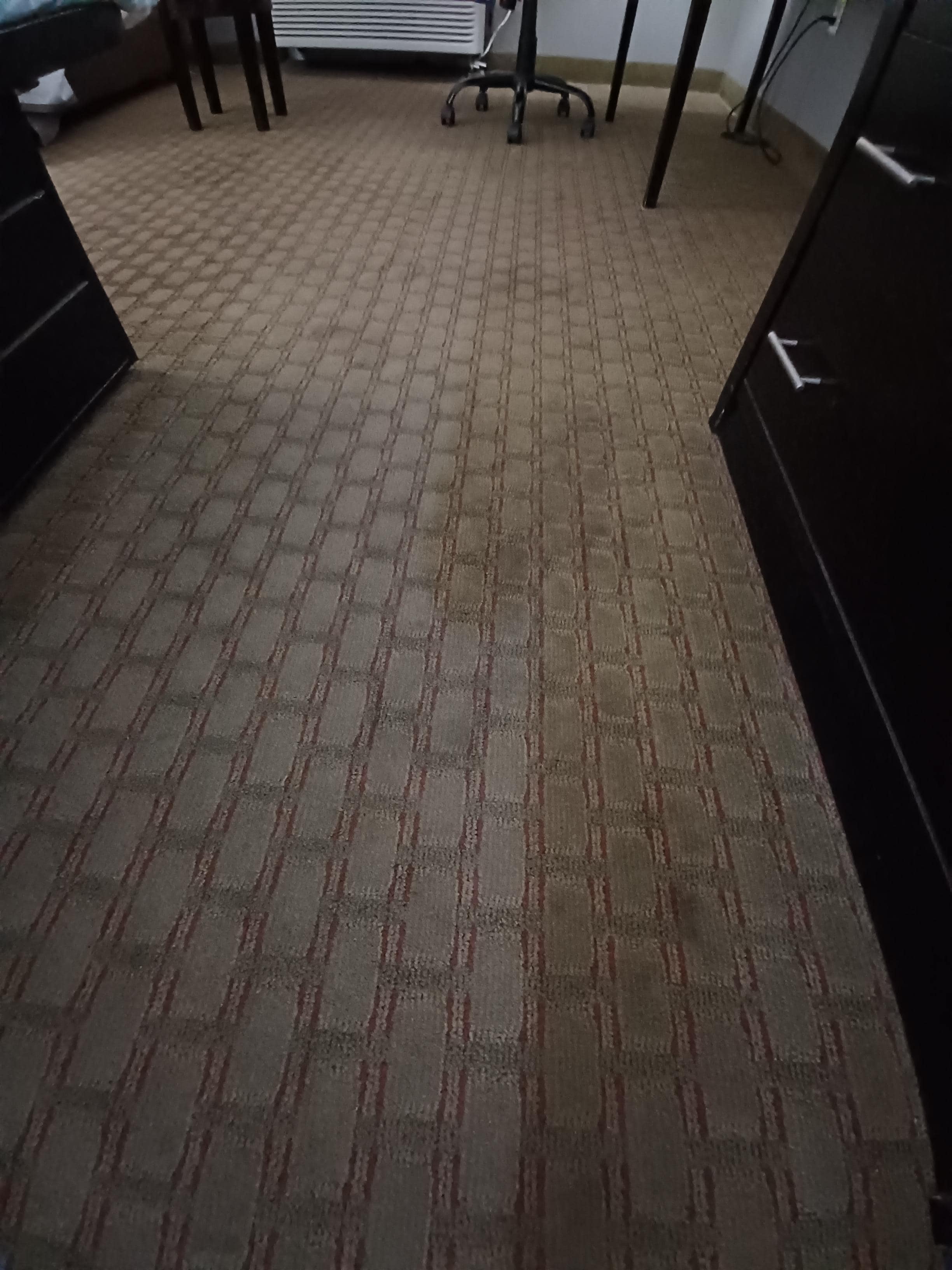 Old looking stained carpet