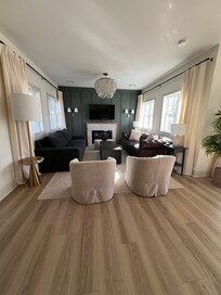 The living room is cozy with plenty of seating