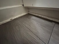 Beat-up, grimy woodwork