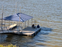 Family fishing off the private dock