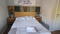 Comfortable double bed . Easily sleeps 2.