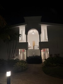 Outside of building/ room property in the evening.