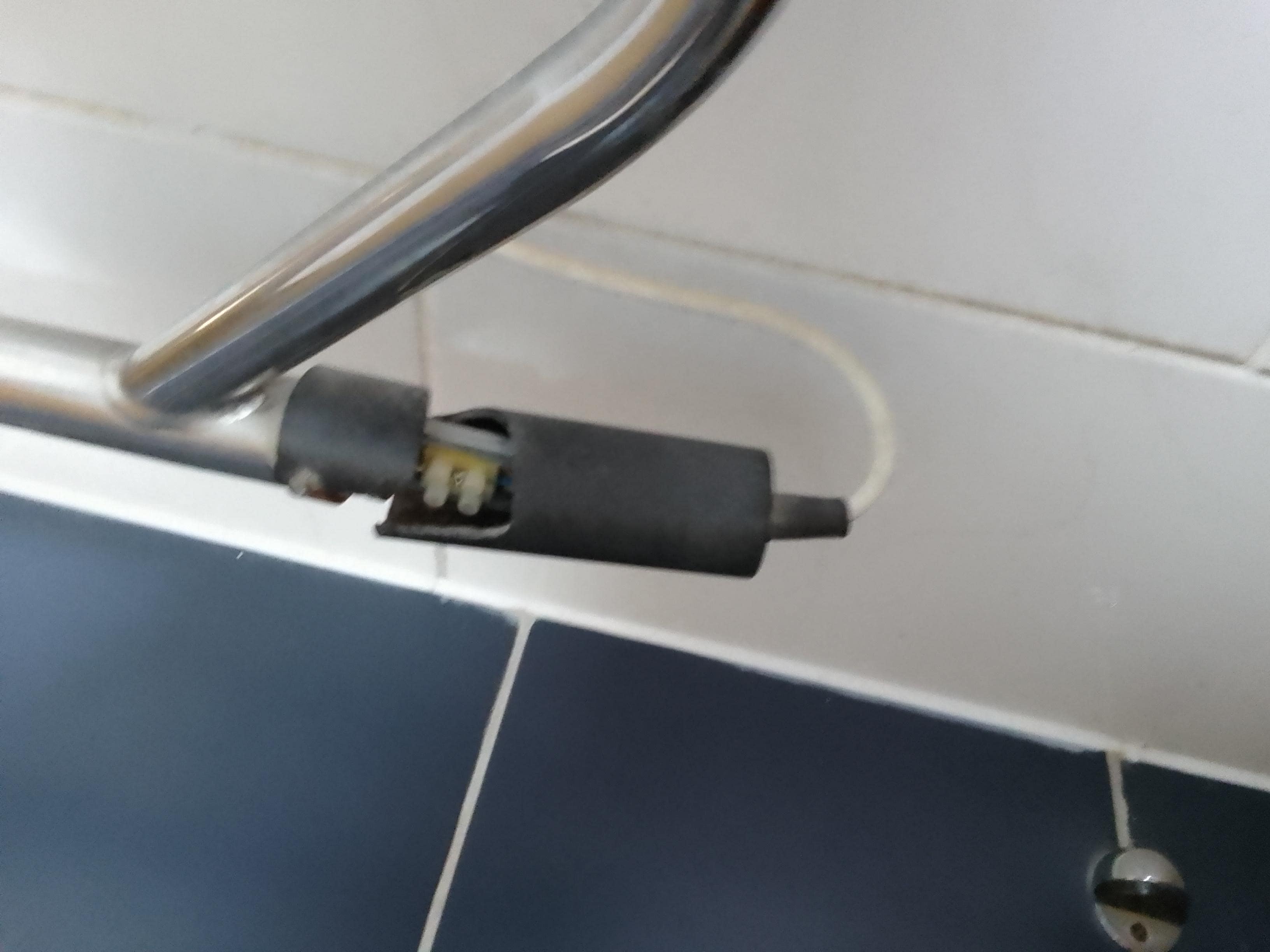 Exposed electric in bathroom