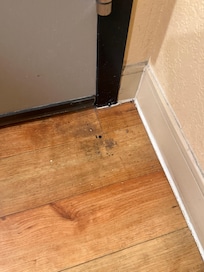 Dirty floor by the entry door
