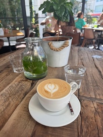 Cappuccino at Santos coffee located in the condo common area