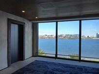 Elevator waiting area inside hotel.