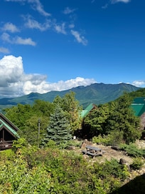 Mountain View from our 3 year olds favorite balcony (“I’m just rocking in my chair watching the mountain”).