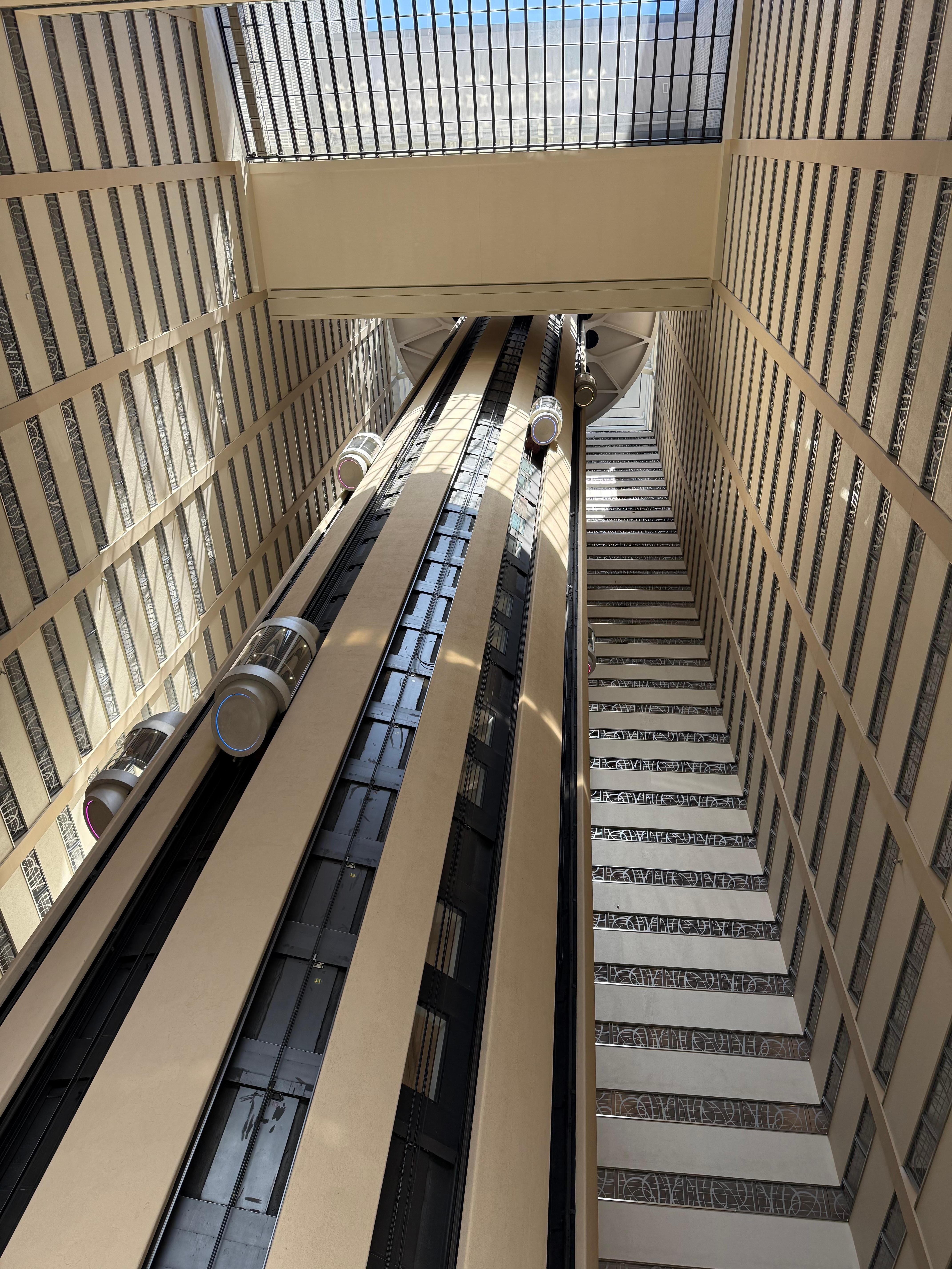 Looking up through elevator well inside hotel