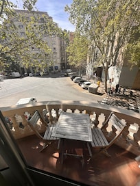 Our view from the balcony. The trees along the streets are so nice!