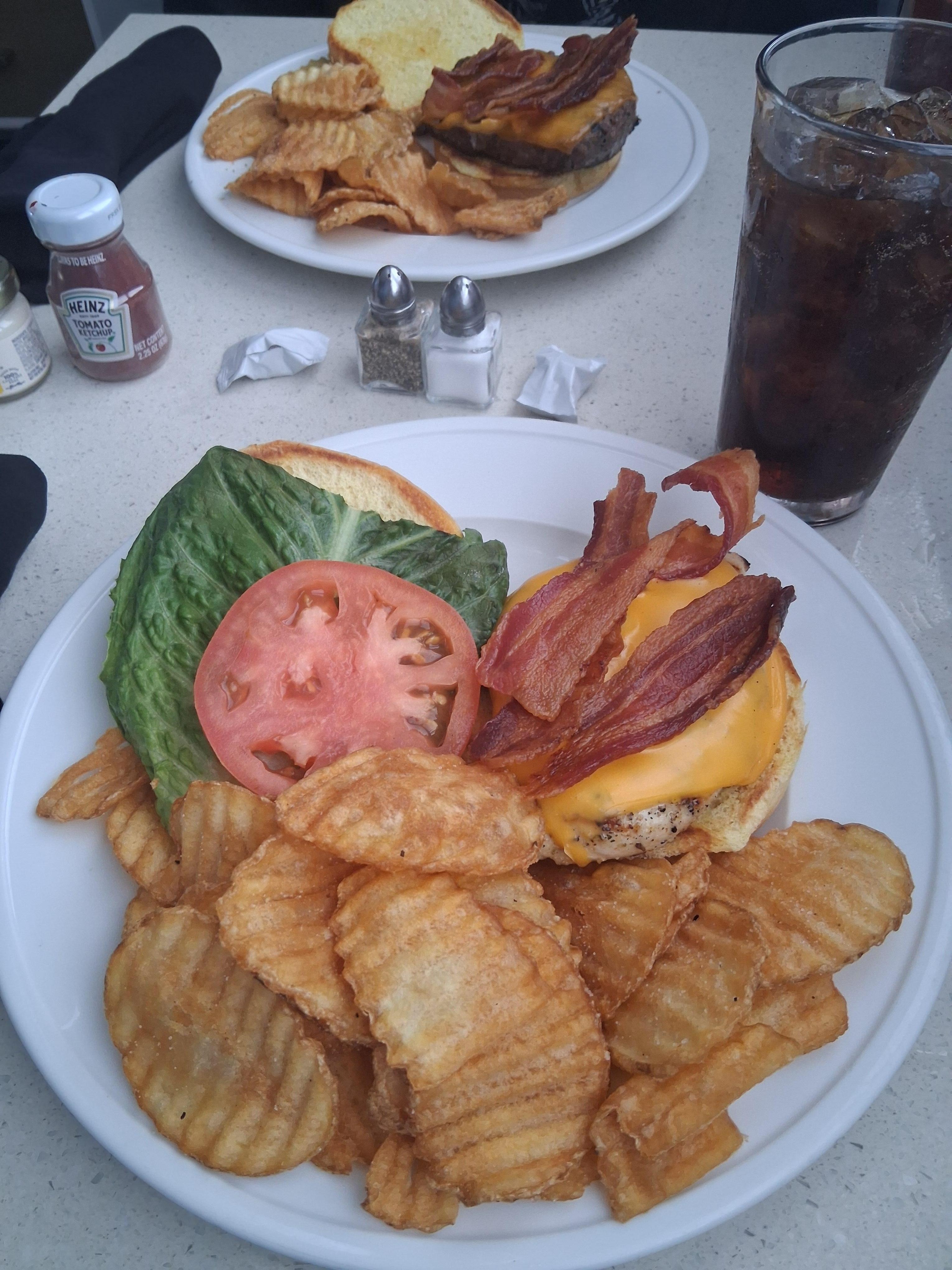 The Bacon Burger with Chips and The grilled chicken sandwich 