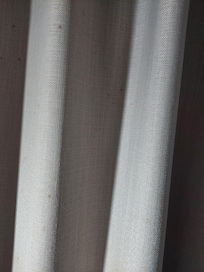 Possible blood splatter on curtains