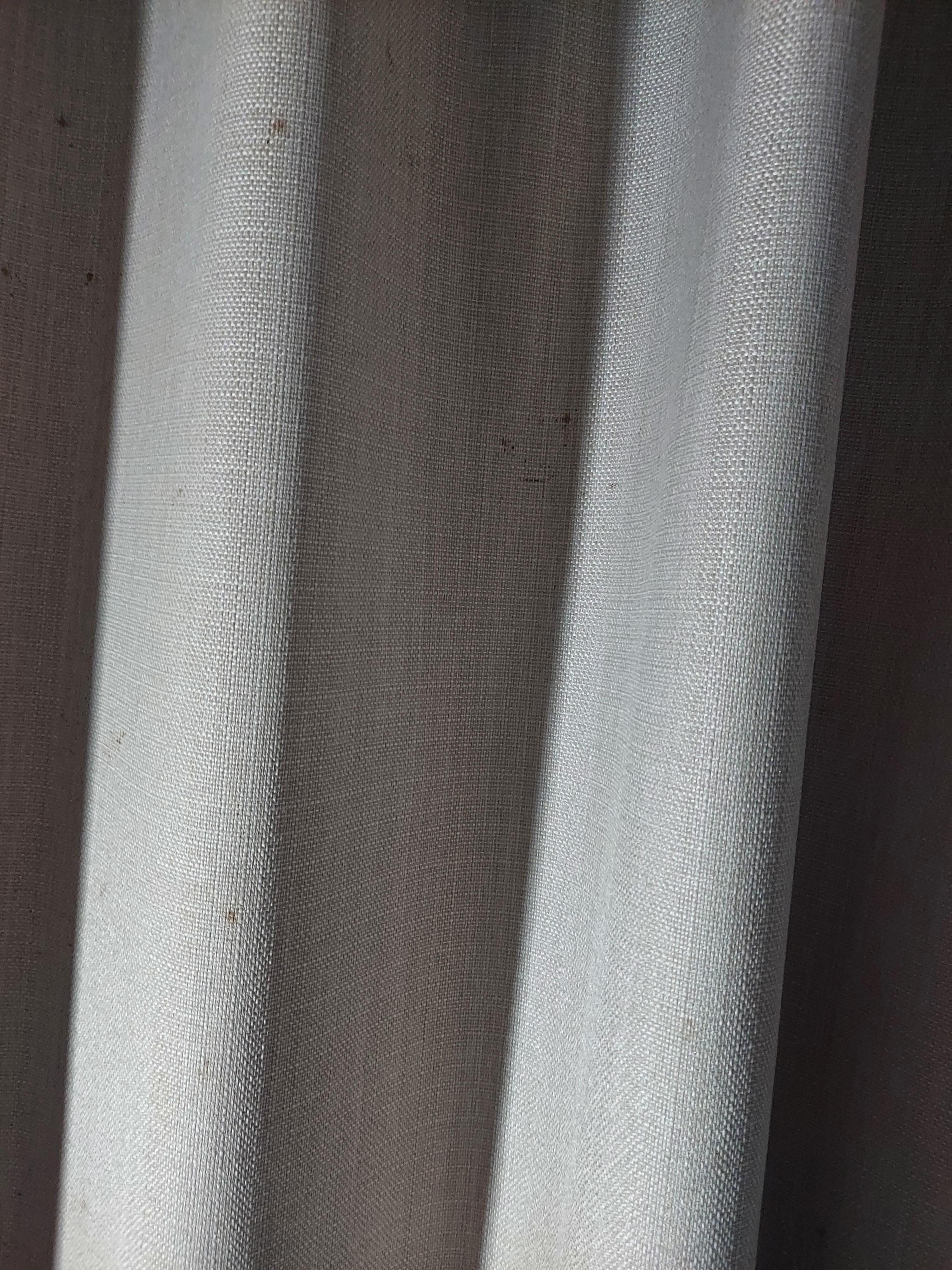 Possible blood splatter on  curtains