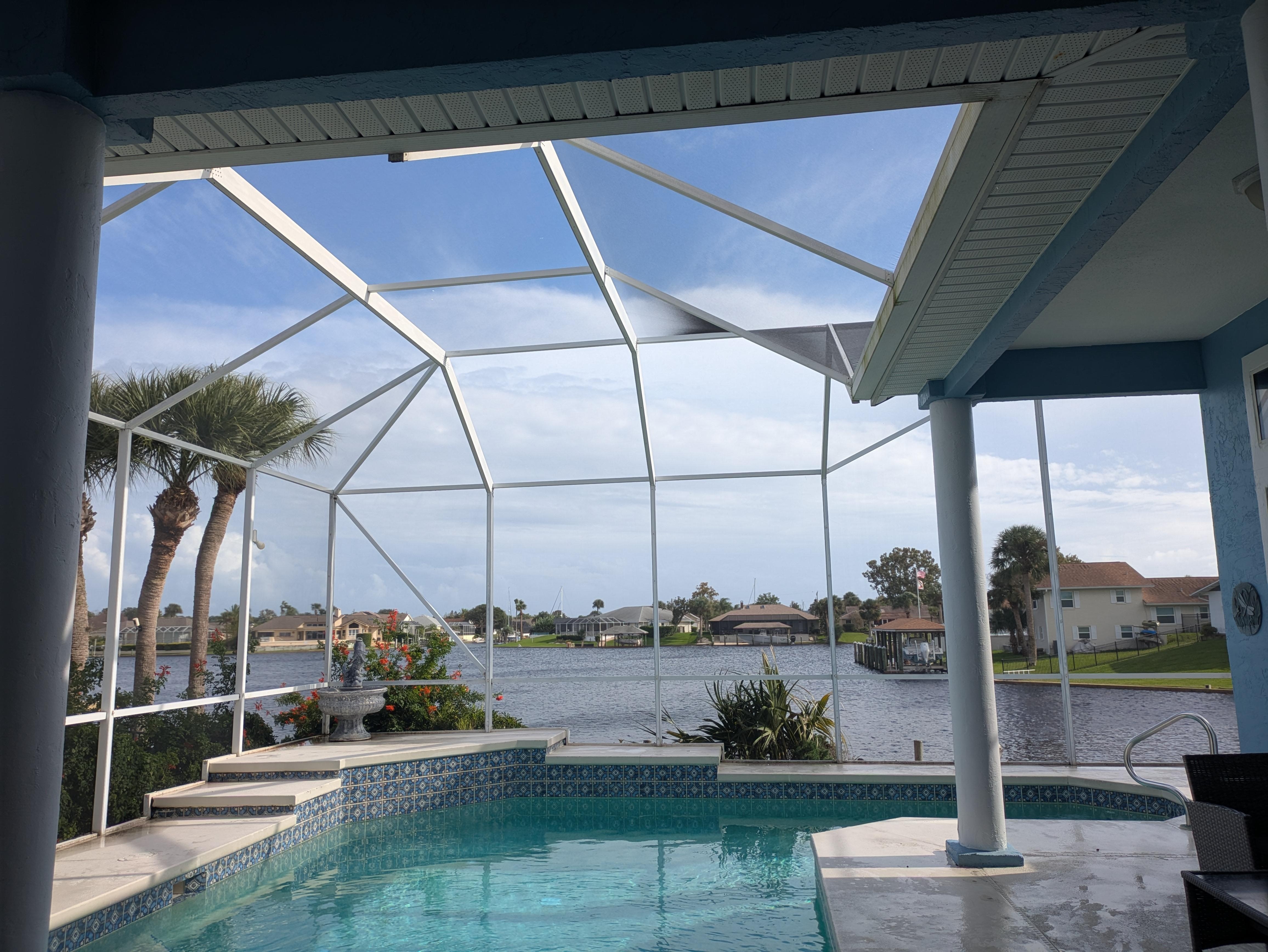 View from table outside by the pool. 