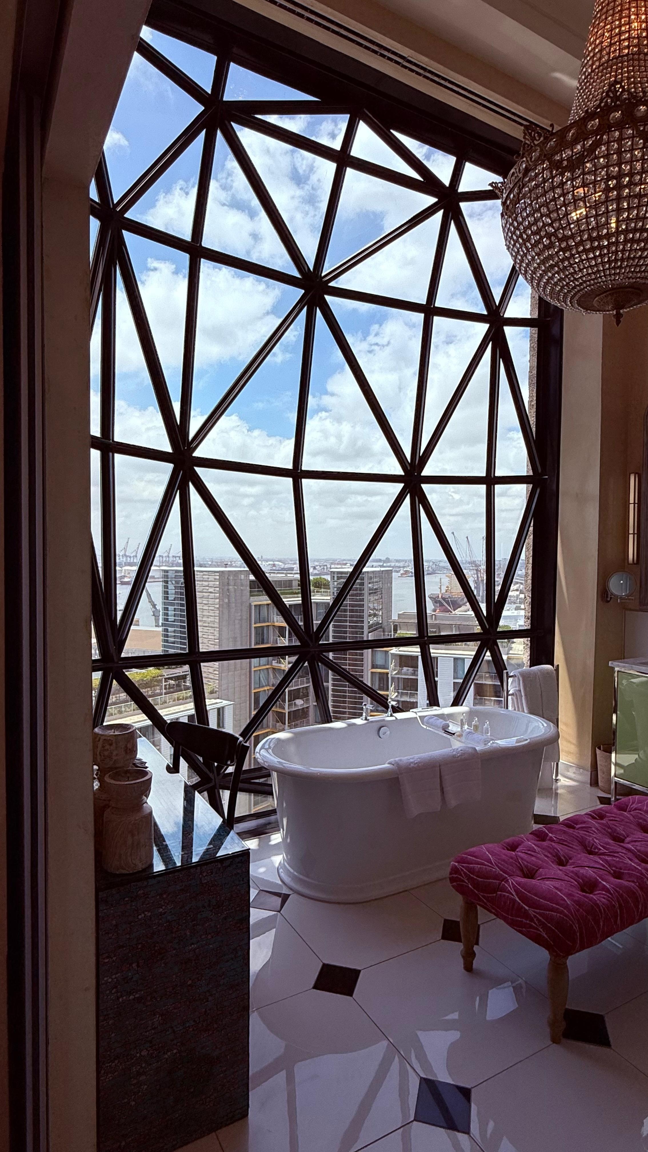 Standard room bathroom (compact and pretty with a large window) 