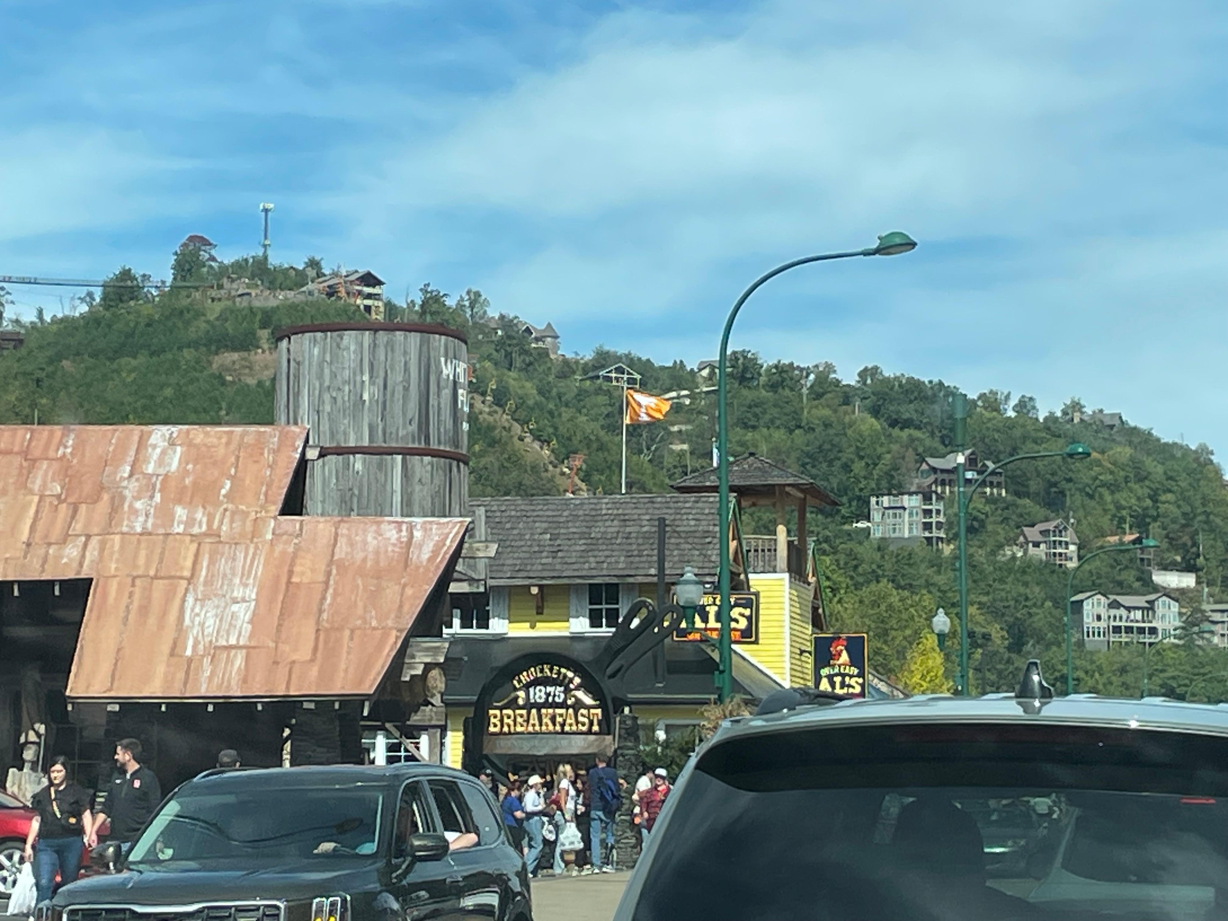 View of the cabin (white frame) from downtown).