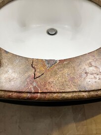 Broken bathroom countertop.