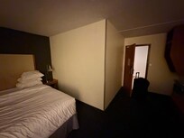 View from inside of room sharing with the elevator.