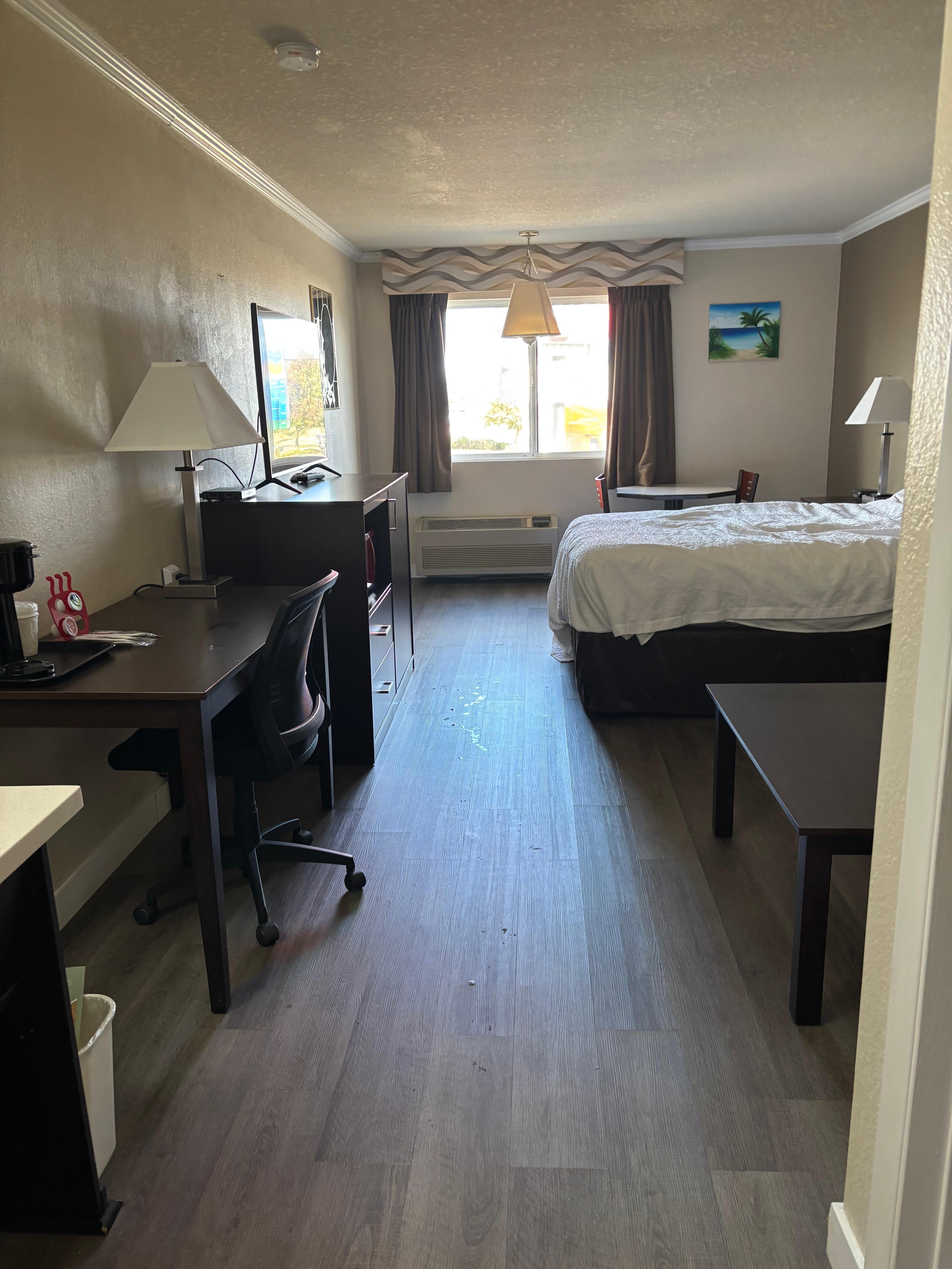 Spacious room with sofa. 