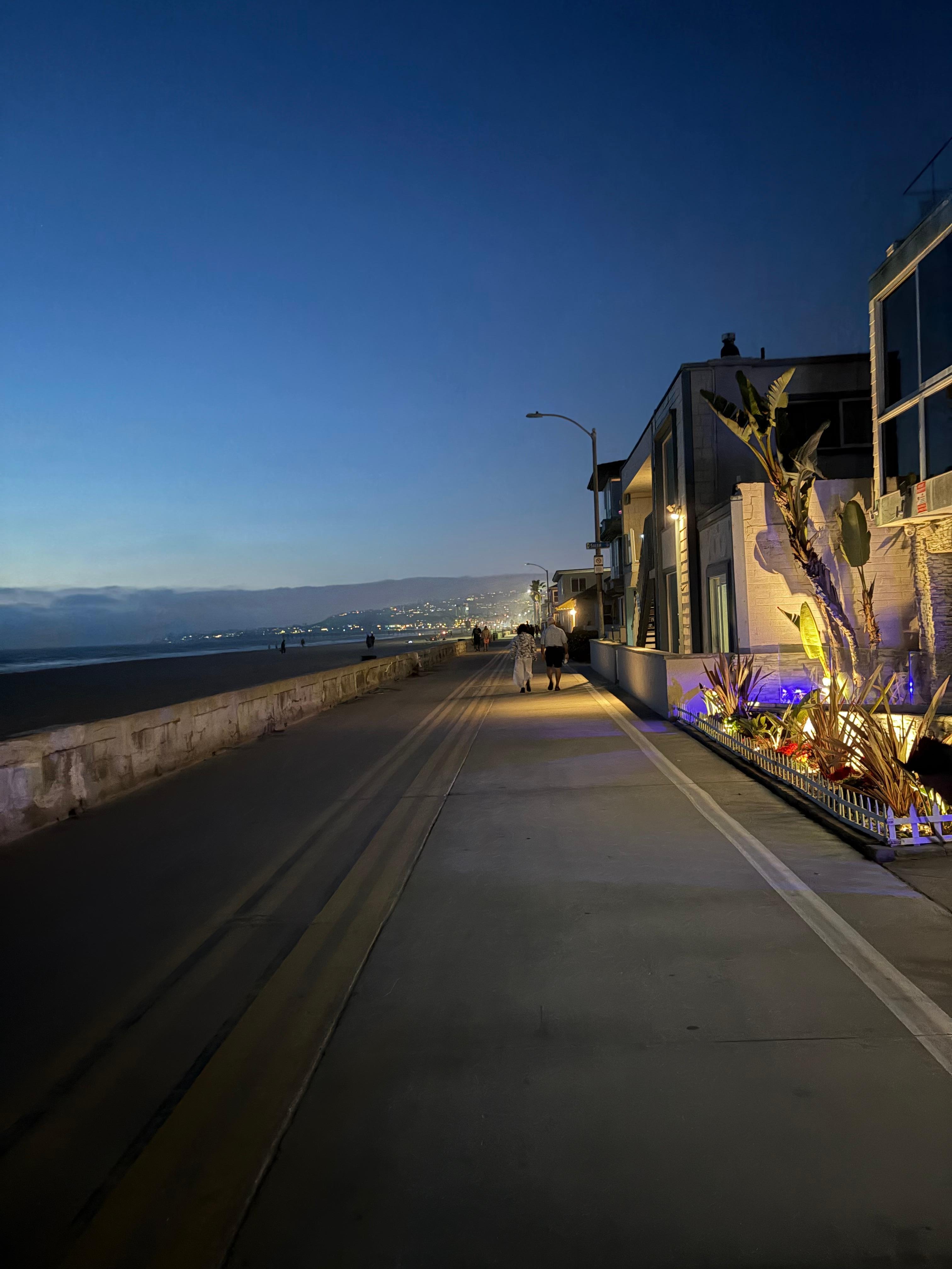 Night boardwalk to World Famous.