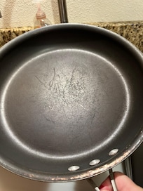 Two skillets, one unusable teflon,