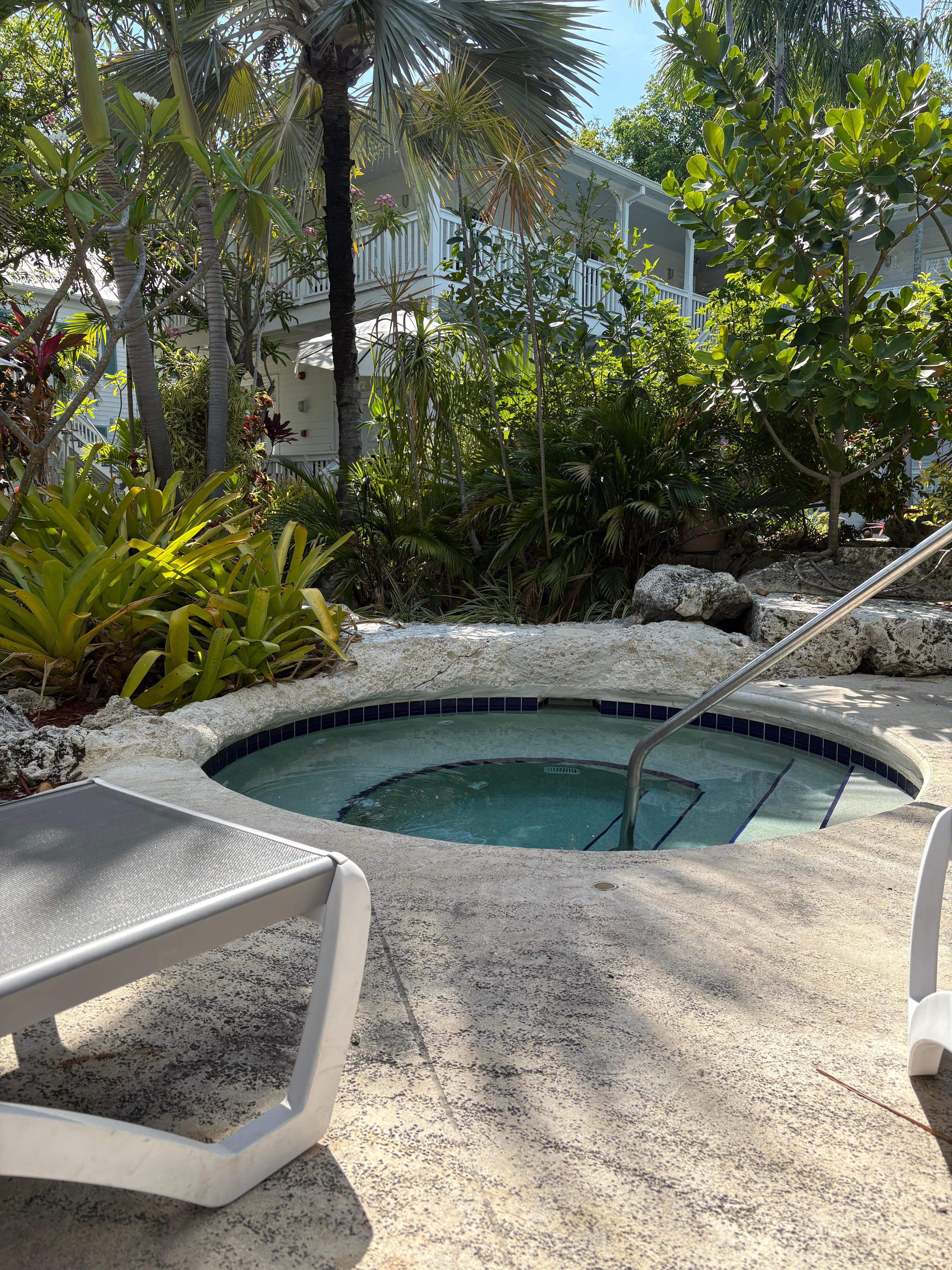 Hot tub near the pool for more private suntanning.