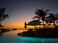 View from the pool overlooking the ocean just after sunset