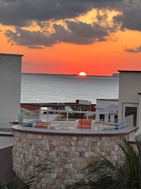 Sunset on other side of rooftop