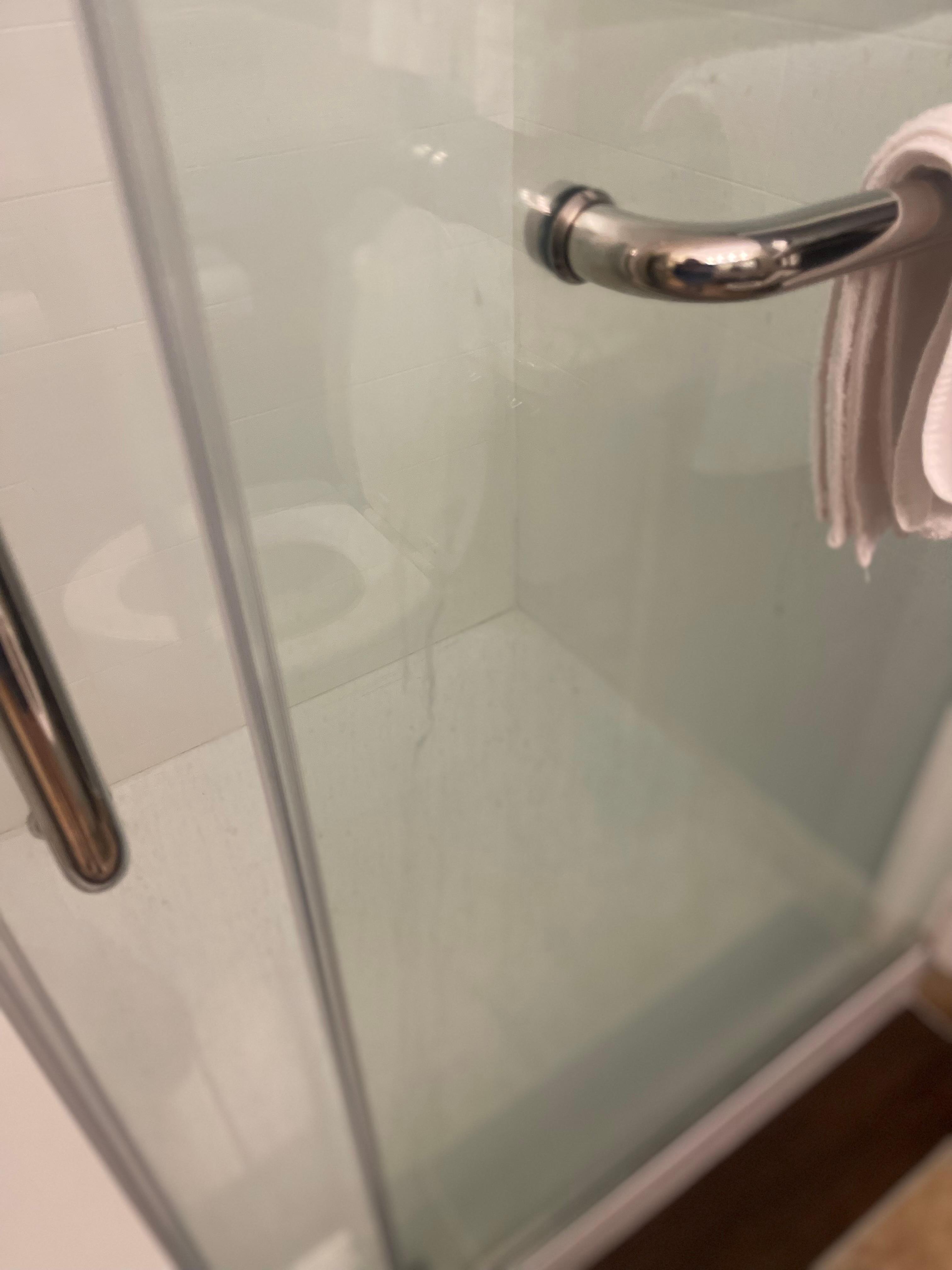 Soap scum on shower door 