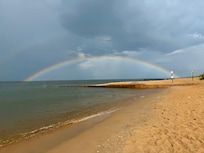 Short walk to the beach, and enjoyed a brief storm and double rainbows. Happy Pride!
