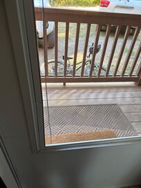 Screen ripped open when we got there, letting bugs in. Also front porch railing not secured