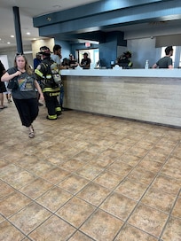 Fire dept for fire alarm.