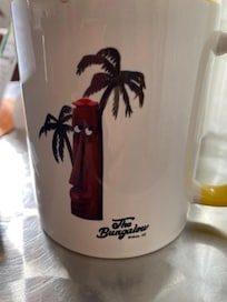 the statue outside is copied onto a mug you can buy.