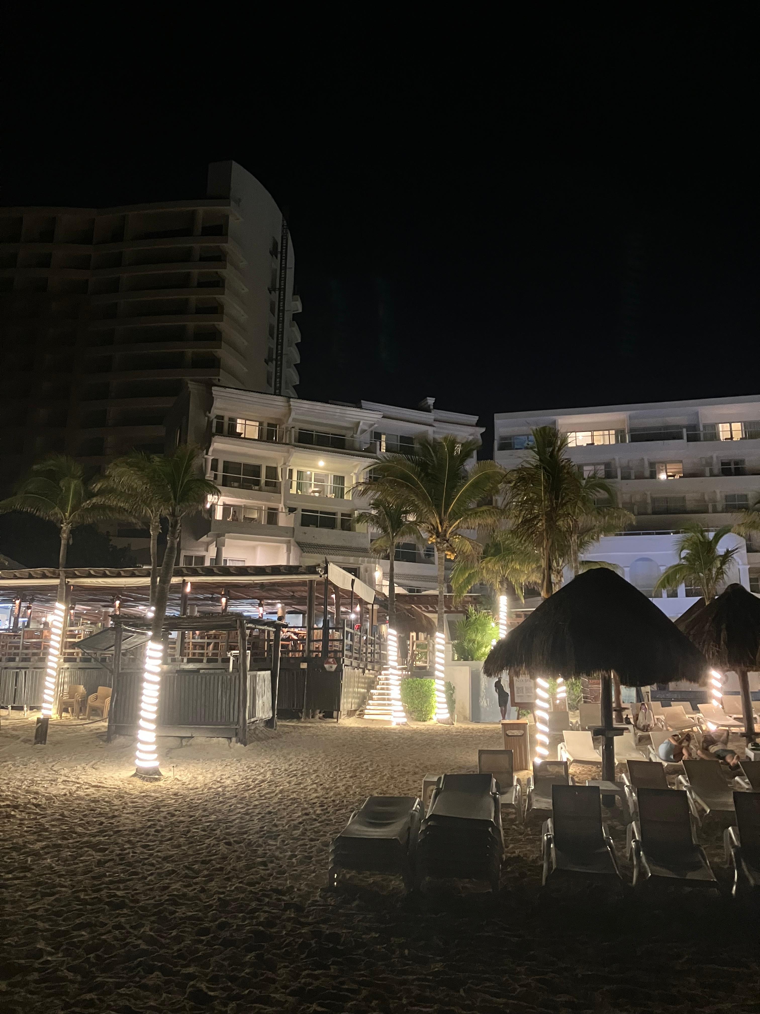 View at night from the beach facing the eating area ..