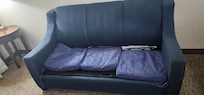 Couch with outdoor cushions