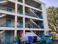 Back side where the parking lot is.