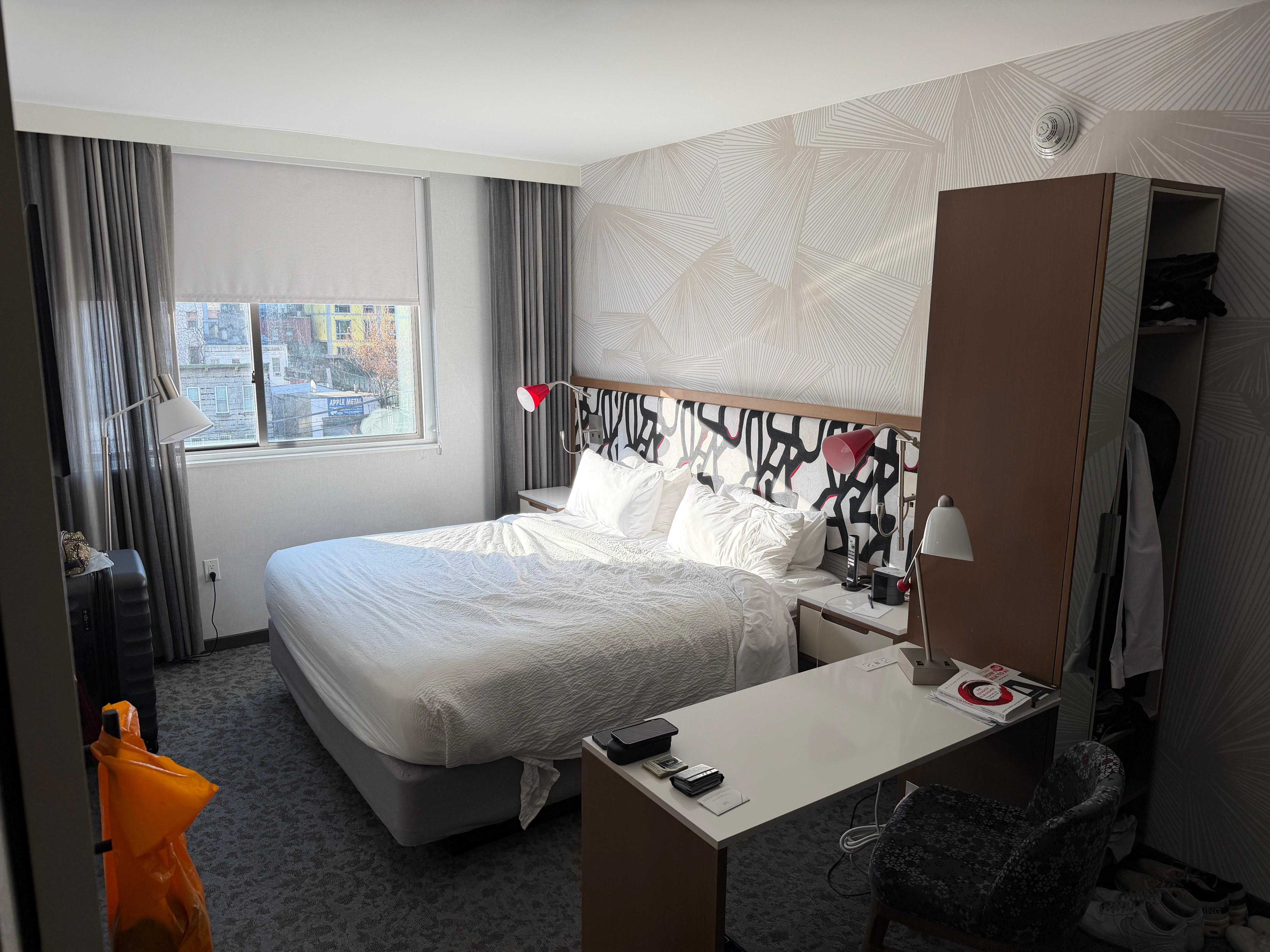 Bedroom: Bed, work desk, hanging space, iron, ironing board 