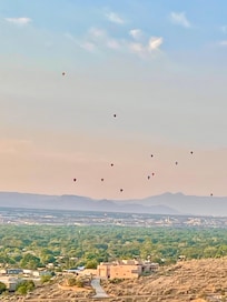 Look closely & you’ll see hot air balloons in the distance.